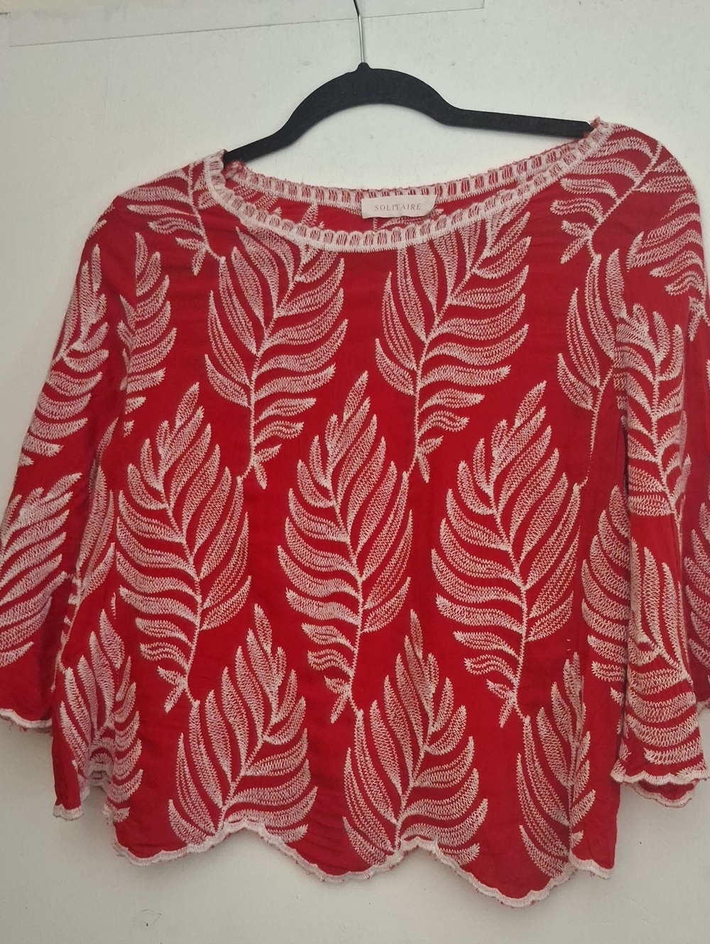 Solitaire Red Knit Tunic with White Leaf Motif